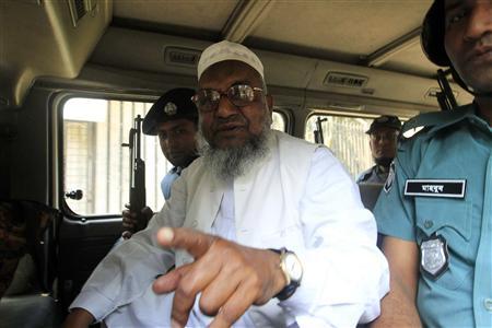 Bangladesh's Jamaat-e-Islami leader Abdul Quader Mollah following his conviction for war crimes. February 5, 2013. Image via Reuters/Stringer/Files.